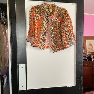 Thin jacket, black,mustard, orange. Shell buttons.